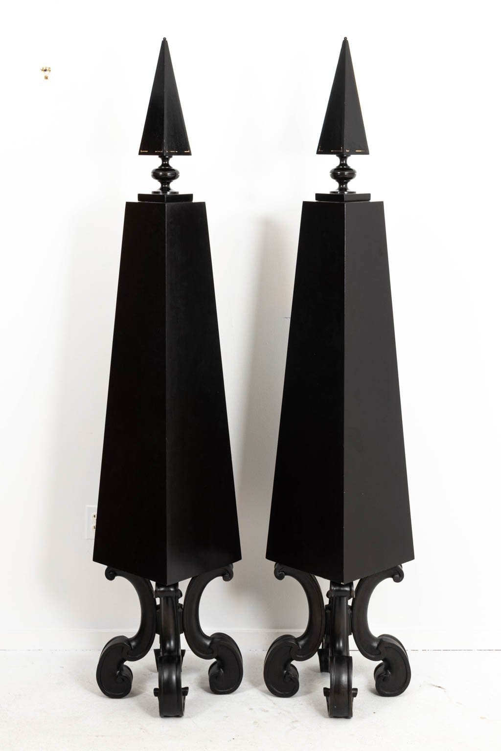Pair of Black Painted Geometric Obelisks